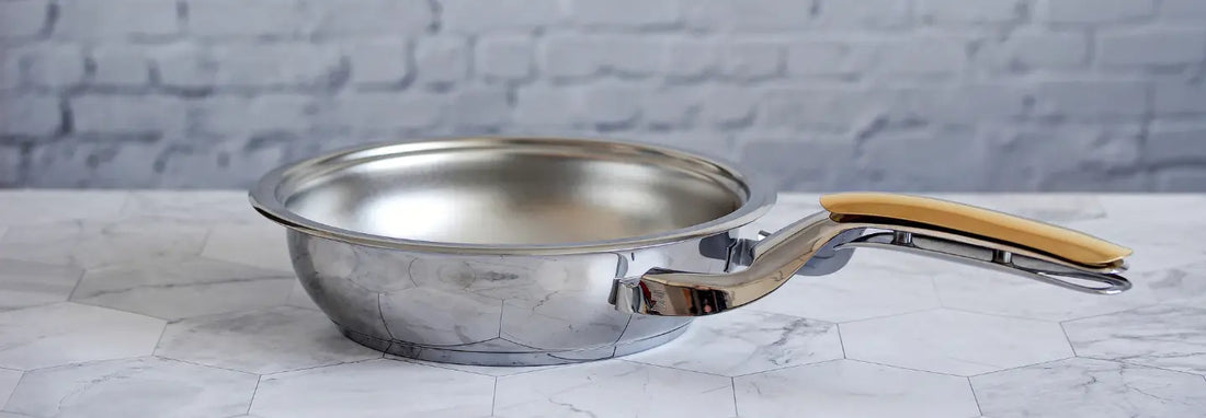 Zepter URA stainless steel frying pan with dome lid on a New Zealand kitchen induction cooktop