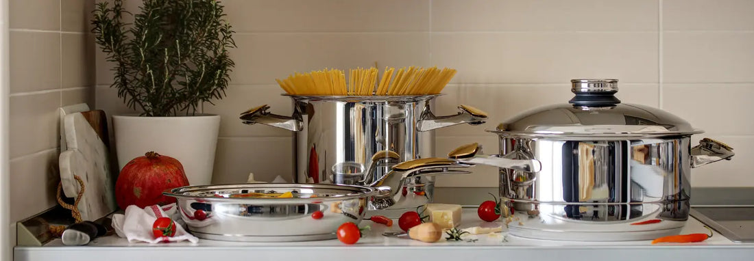 Zepter Masterpiece pots and pans set arranged on a modern NZ kitchen benchtop