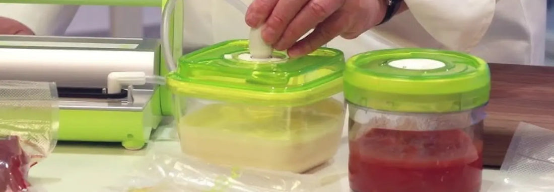 VacSy vacuum sealer with sealed food bags and glass vacuum containers in a New Zealand kitchen