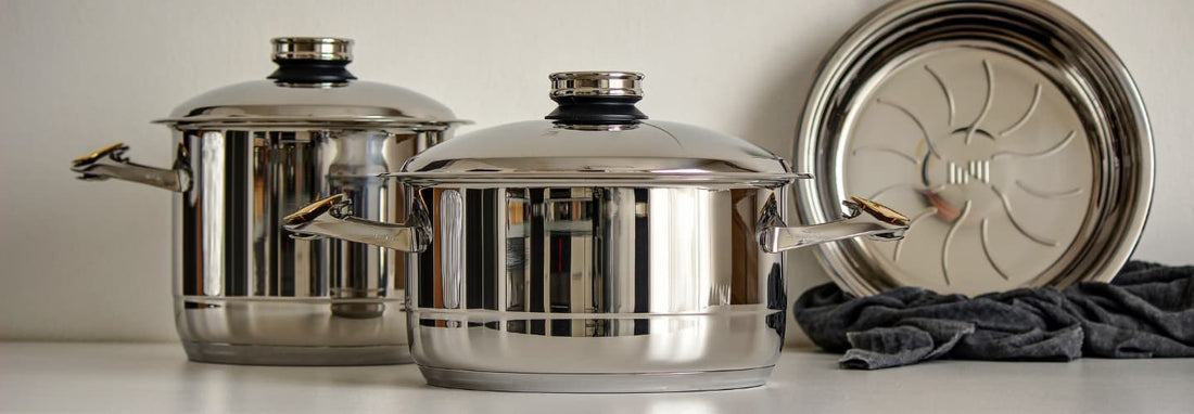 Large stainless steel stock pot on a New Zealand kitchen cooktop for pasta, soup and batch cooking