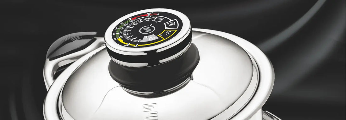 Stainless steel saucepan and sauté pan on an induction cooktop in a bright kitchen